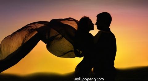 Romance couple dancing in love sunset