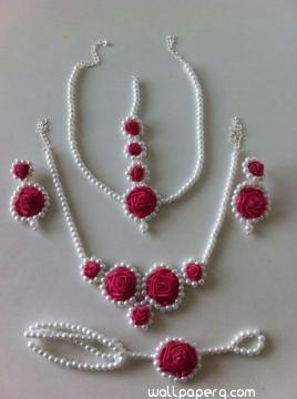 White and pink floral jewellery for bride mehendi 