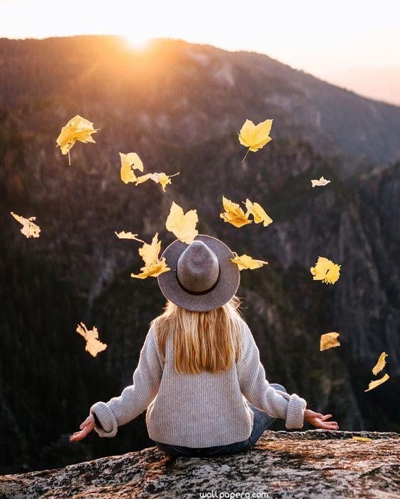 Alone girl on the top of the mountain image