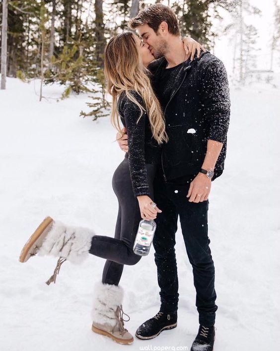 Romantic love kiss in the snow image