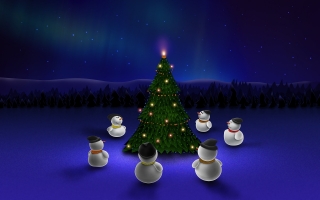 Snowmen around tree