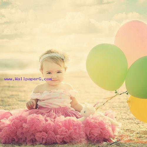 Baby with ballons