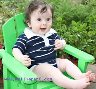 Baby on green chair