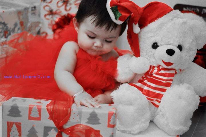 Cute baby with cute teddy