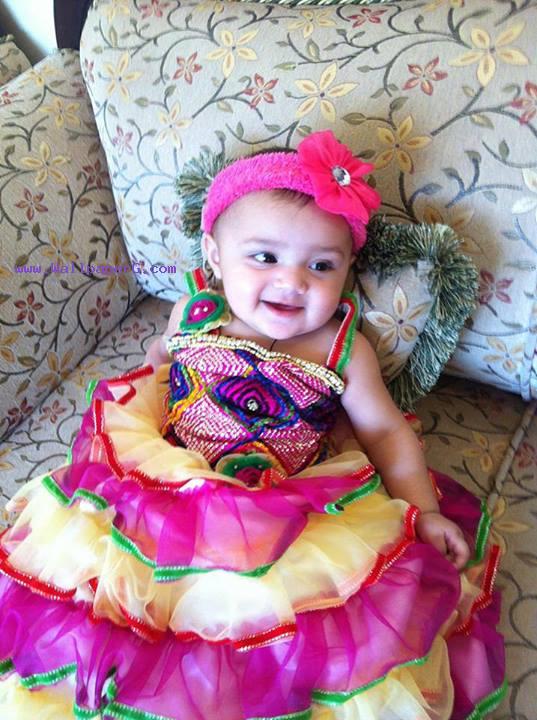 cute baby girl in pink frock