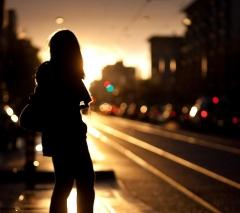 Girl walking on street to