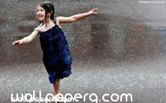 Rainy season cute kido girl enjoying