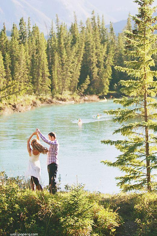 Dancing couple besides the sea