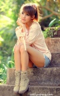 Stylish girl sitting alone