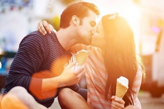 Boy and girl ice cream kissing