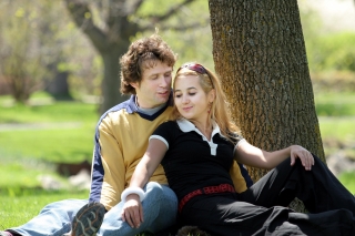 Young couple having picnic in a park hd wallpaper