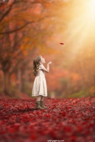 Girl playing with leaf hd wallpaper