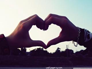 A heart made with hands hd wallpaper