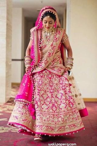 Bride in pink attire ready for wedding