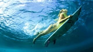 Girl swim and surf
