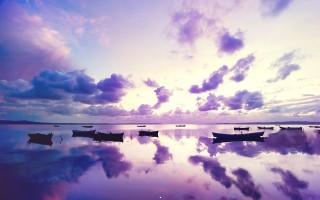 Purple sunset in ocean