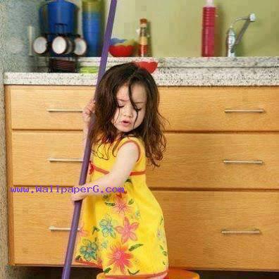 Sweet baby with broom