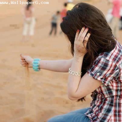 Girl playing with sand