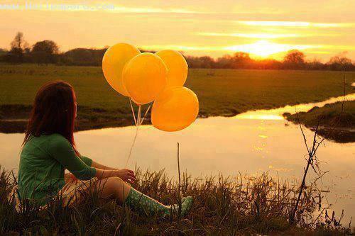 Girl along the ballons