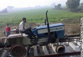 Indian tractor on train t