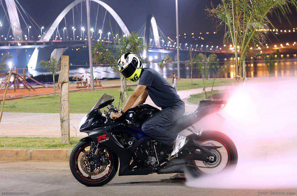 Stunt man with cool bike