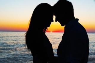 Romantic sunset couple meet